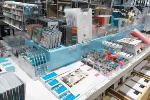 Clear Acrylic Product Holders Merchandising Retail Goods On Store Shelving