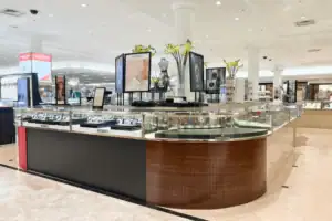 Installed Jewelry Counters With Wood Veneer Bases And Glass Display Tops In A Department Store