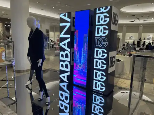 Dolce & Gabbana Digital Display Towers With Video Screens in a Retail Aisle