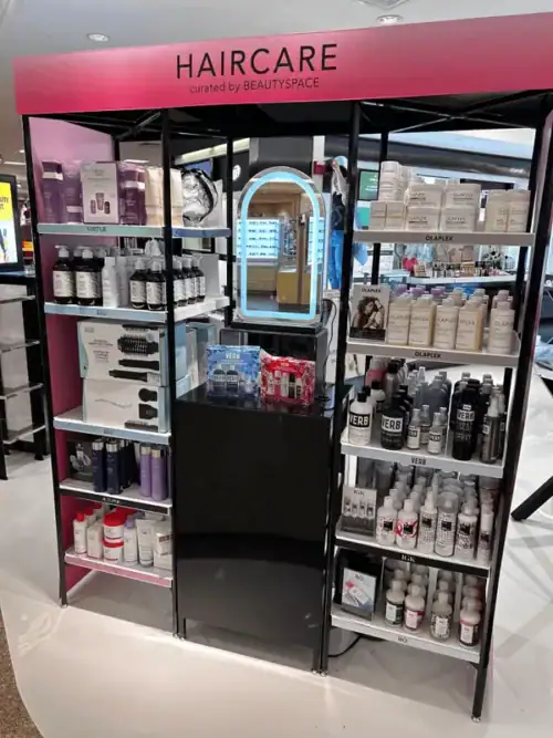 Lighted Haircare Brand Tower With Product Shelves and Graphic Side Panels