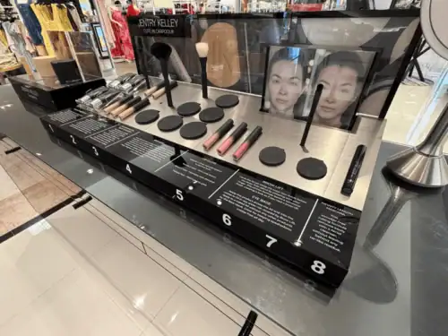 Cosmetics Testing Station With Acrylic Product Wells, Brushes and Numbered Makeup Stations