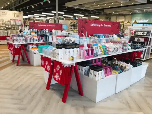 Store Interior With Custom Metal, Plastic and Wood Fixtures and Sawhorse Display Tables