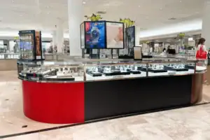 Remodeled Watch Counter With Red Slat Panel, Wood-Look Trim And Tissot Branding