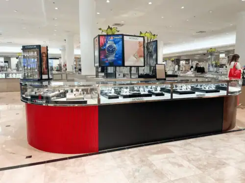 Remodeled Watch Counter With Red Slat Panel, Wood-Look Trim and Tissot Branding