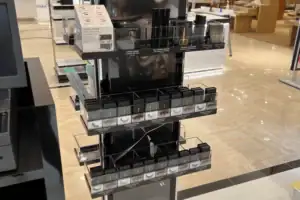 Retail Wall Shelving With Acrylic Bins And Graphic Panels For Lash Star Beauty Products