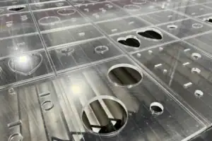 Detail Of Turret-Punched Sheet Metal With Precision Cutouts And Formed Holes