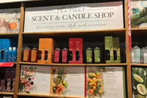 Wood Retail Display Bay With Product Shelving And Printed Category Graphics